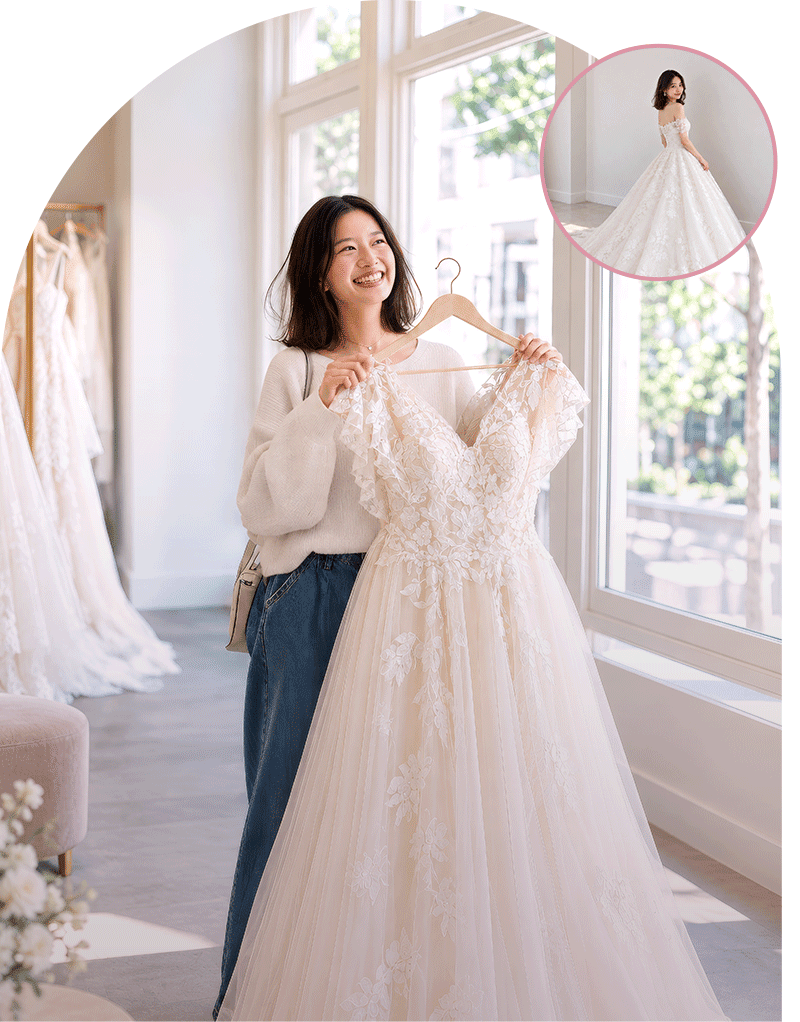 ウエディングドレスを手に取る女性。ここなら、だれでも花嫁に